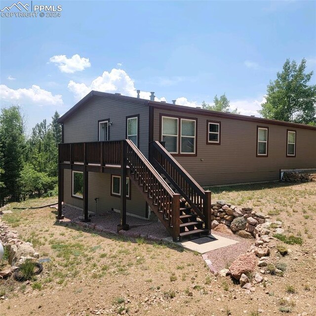 property view of mountains featuring a water view