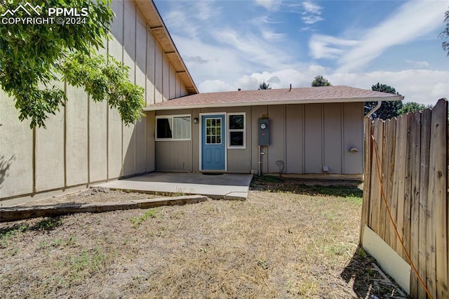 doorway to property with a patio area