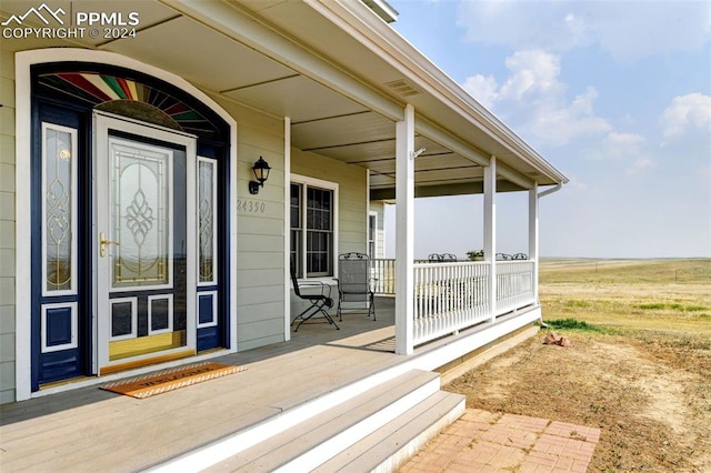 entrance to property with covered porch