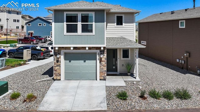 view of front of property featuring a garage