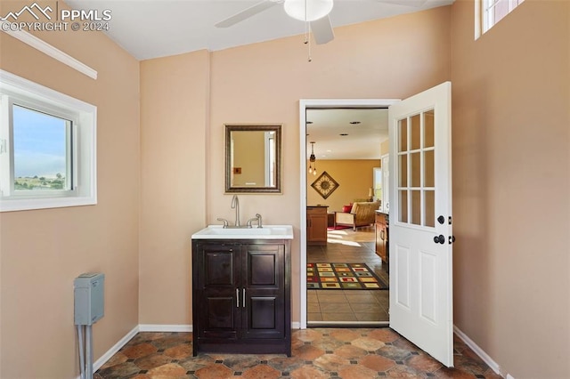 bathroom with vanity and ceiling fan