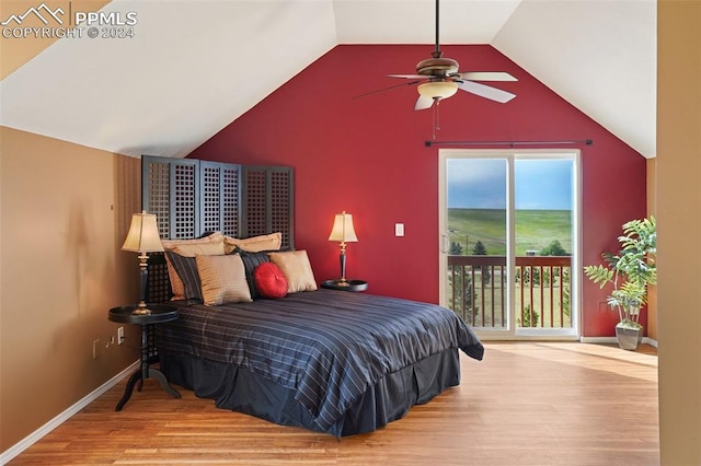 bedroom with lofted ceiling, access to exterior, hardwood / wood-style floors, and ceiling fan