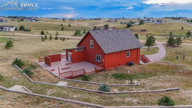 birds eye view of property featuring a rural view