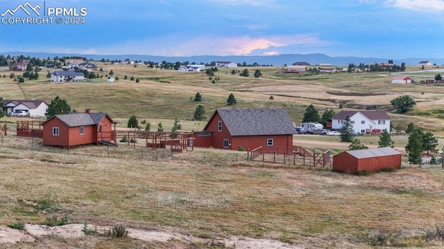 bird's eye view with a mountain view and a rural view