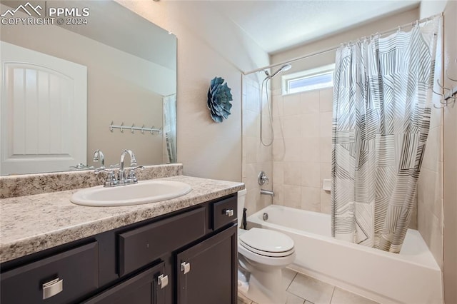 full bathroom with vanity, toilet, tile patterned floors, and shower / bath combo