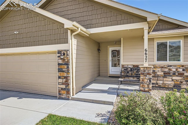 property entrance featuring a garage