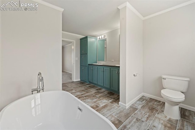 bathroom with toilet, a bath, crown molding, and vanity