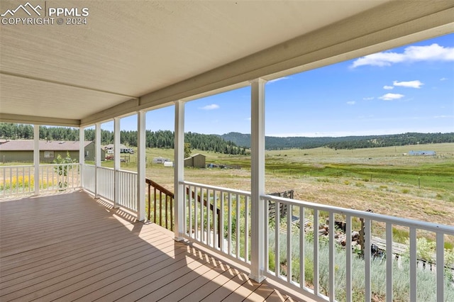 deck featuring a rural view