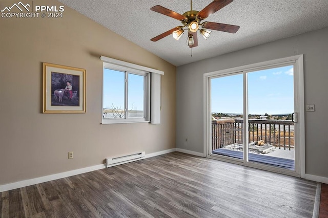 empty room featuring hardwood / wood-style floors, ceiling fan, a baseboard radiator, and a textured ceiling