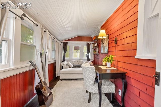 sunroom / solarium with lofted ceiling