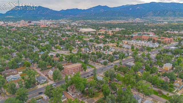 drone / aerial view featuring a mountain view