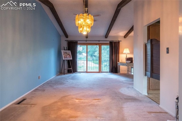 interior space with carpet floors, lofted ceiling with beams, and a chandelier