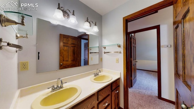 bathroom with dual bowl vanity