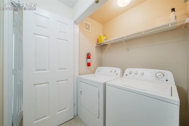 laundry area featuring washer and clothes dryer