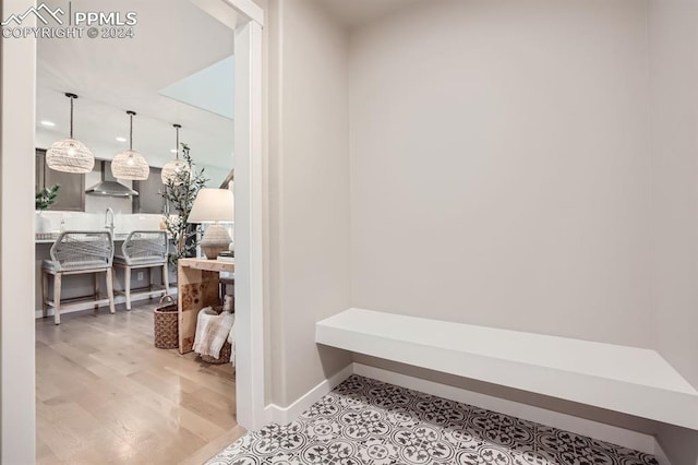 mudroom featuring wood-type flooring