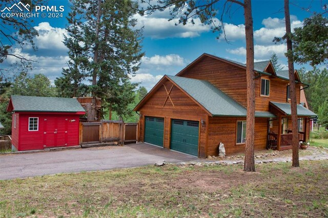 rear view of property featuring a porch