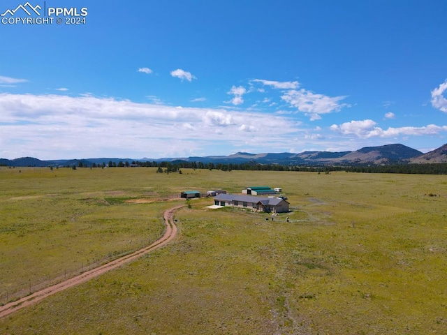 bird's eye view with a mountain view and a rural view