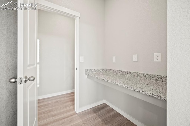 spacious closet featuring light wood-type flooring