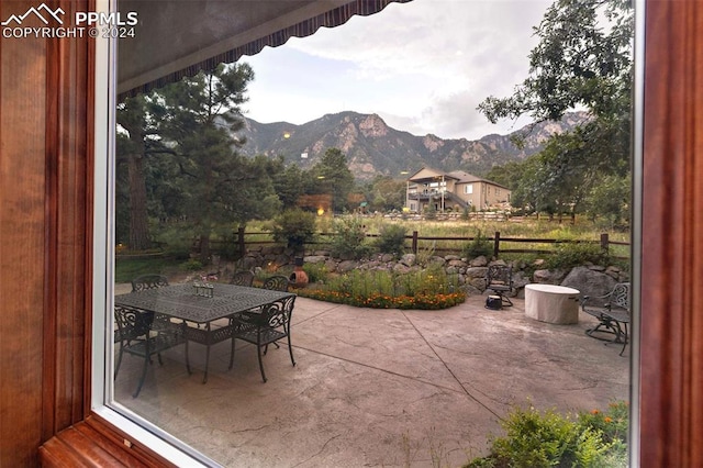 view of patio / terrace featuring a mountain view