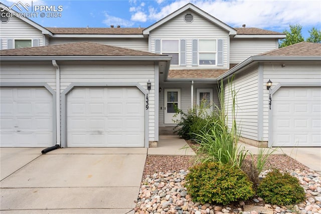 view of property featuring a garage