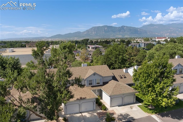 birds eye view of property featuring a mountain view