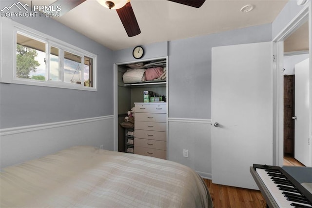 bedroom featuring ceiling fan and light hardwood / wood-style flooring