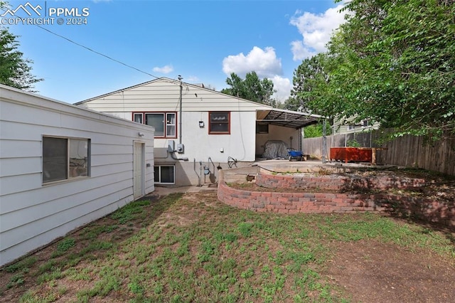 rear view of house featuring a patio