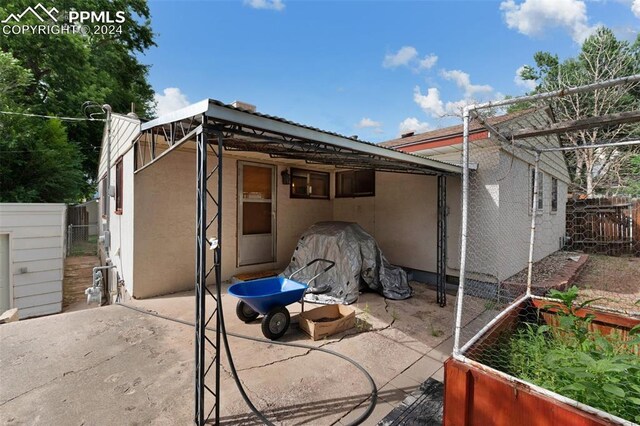 rear view of house with a patio