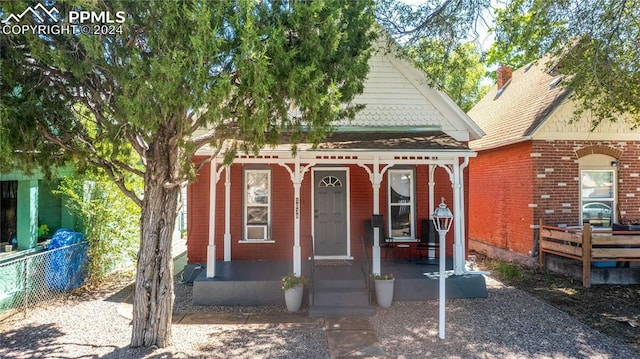 view of front of property featuring covered porch