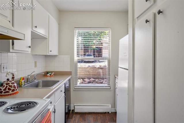 kitchen featuring a baseboard heating unit, white cabinets, dark wood-type flooring, premium range hood, and sink