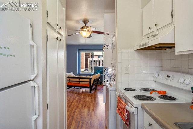 kitchen with decorative backsplash, ceiling fan, white cabinets, white appliances, and wood-type flooring