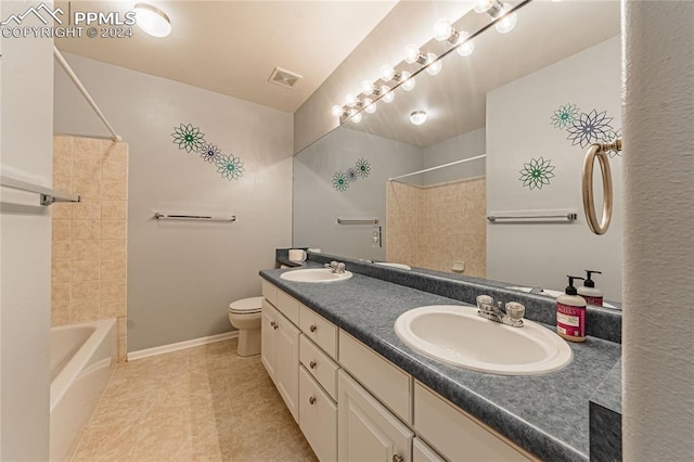 full bathroom with toilet,  shower combination, and vanity