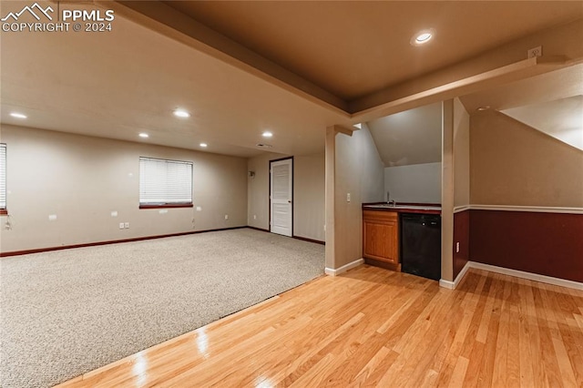 interior space with sink and light hardwood / wood-style flooring