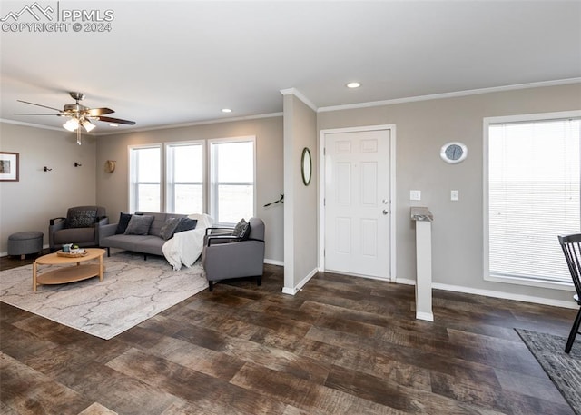 living room featuring ceiling fan, dark hardwood / wood-style floors, and ornamental molding