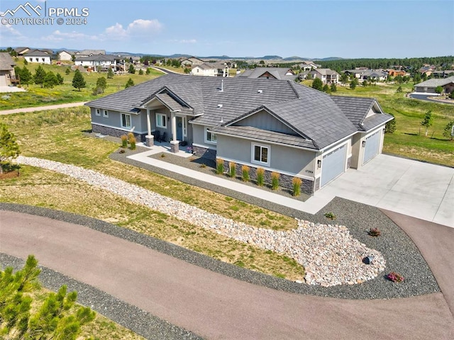 ranch-style house featuring a garage