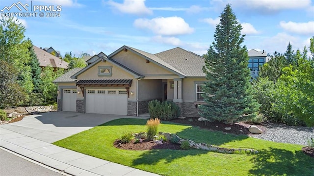 craftsman-style home featuring driveway, stone siding, a front yard, and stucco siding