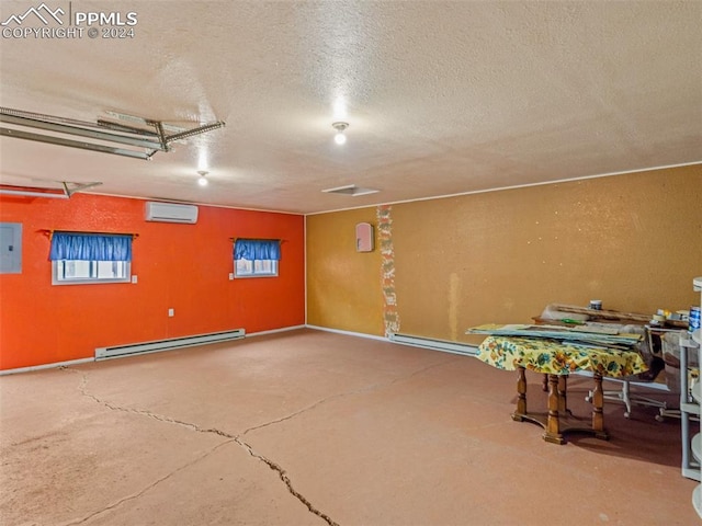 interior space with baseboard heating, an AC wall unit, and electric panel