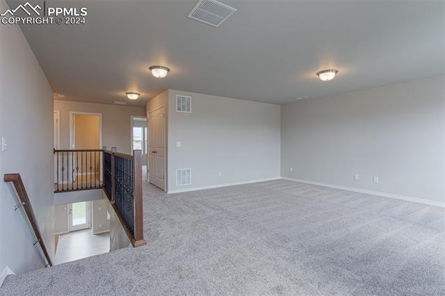 view of carpeted spare room