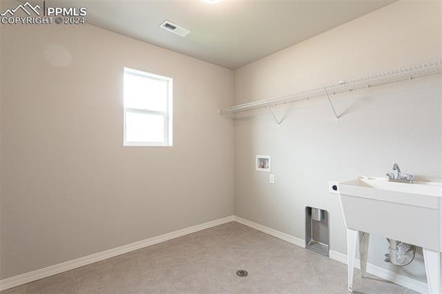 laundry area with washer hookup