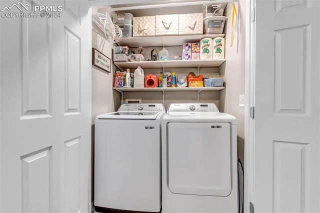 laundry room featuring separate washer and dryer