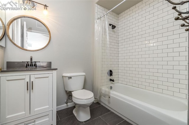 full bath with baseboards, toilet, tile patterned flooring, shower / bath combo with shower curtain, and vanity