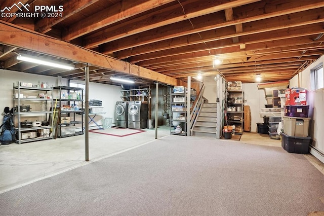 basement featuring separate washer and dryer, light carpet, and a healthy amount of sunlight