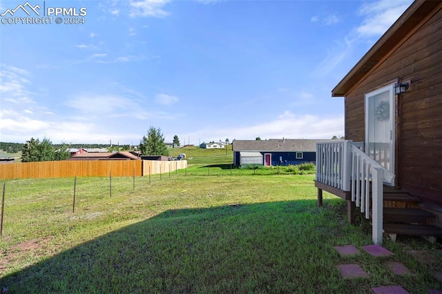 view of yard featuring fence