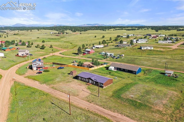 drone / aerial view with a rural view and a mountain view