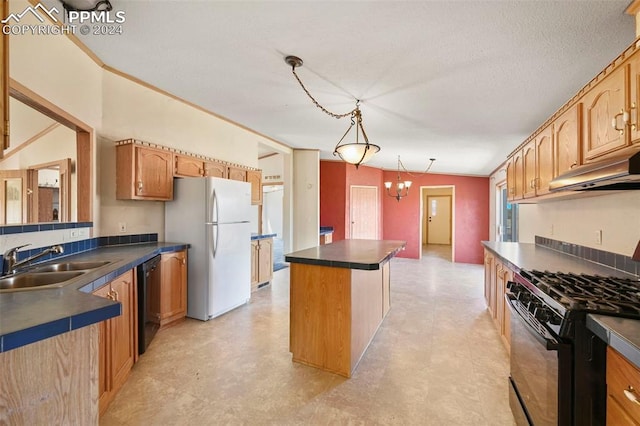 kitchen with dark countertops, a kitchen island, black appliances, pendant lighting, and a sink