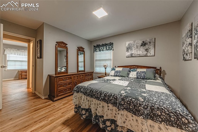 bedroom featuring light hardwood / wood-style floors