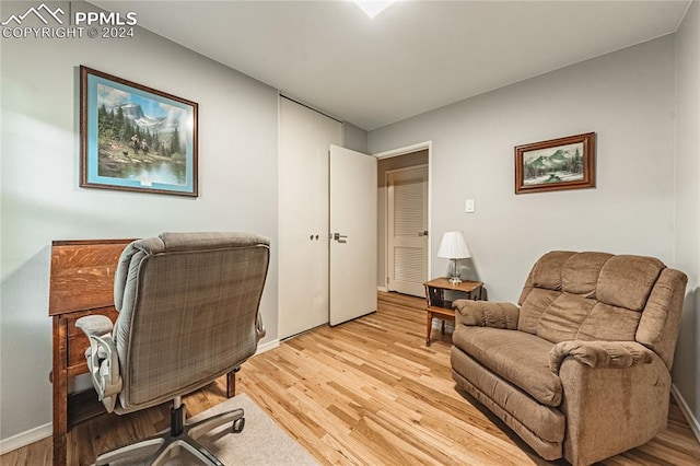 office area with light hardwood / wood-style floors