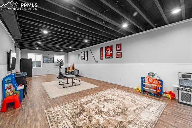 playroom with hardwood / wood-style floors