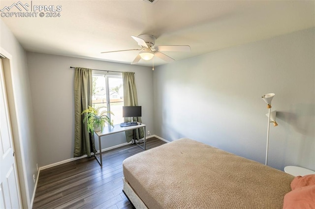 bedroom with ceiling fan and wood-type flooring