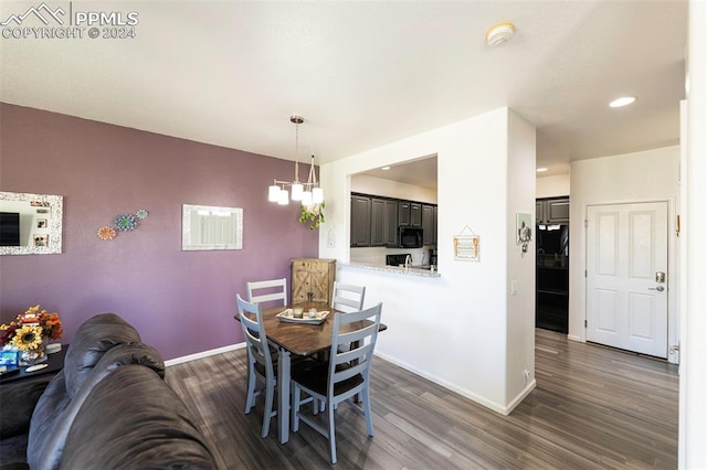 dining room featuring dark wood-type flooring